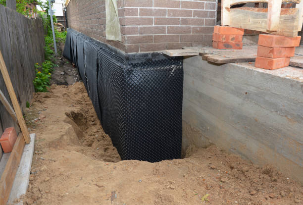 SJ Waterproofing Pros technician performing targeted Waterproofing assessment in Chapel Hill, TN
